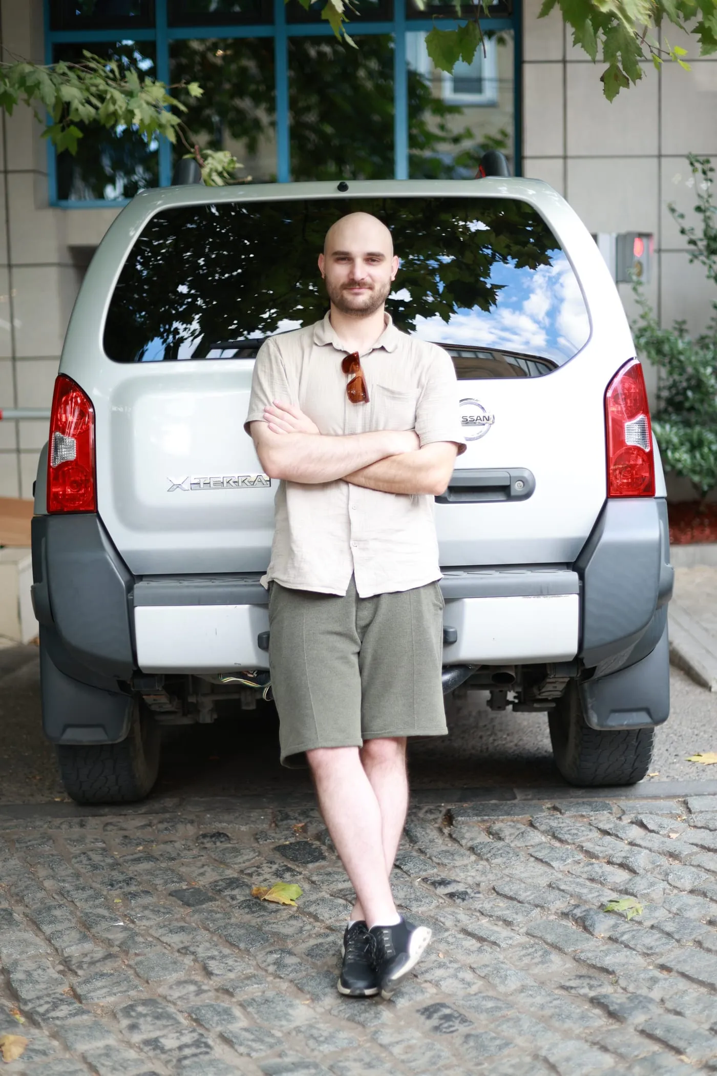 A Silk Road Rentals team member with the Nissan X-Terra 4x4 in Tbilisi, Georgia